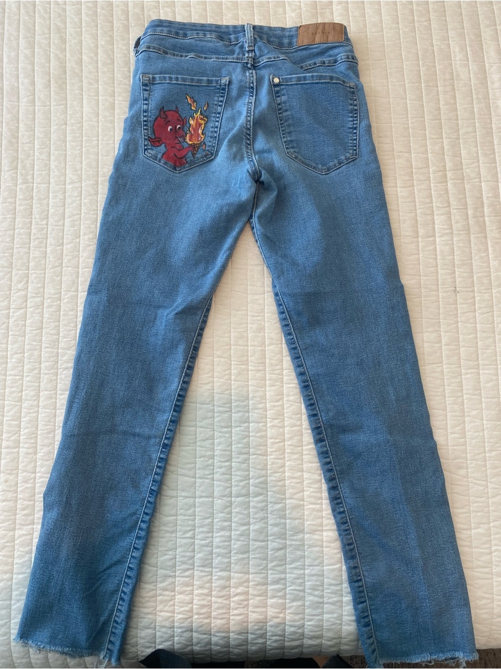 Light Wash Denim Jeans with Red Devil Flame